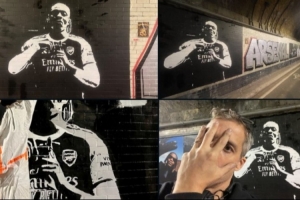 九游体育平台-连夜创作，街头艺术家绘制埃泽身穿阿森纳球衣的壁画